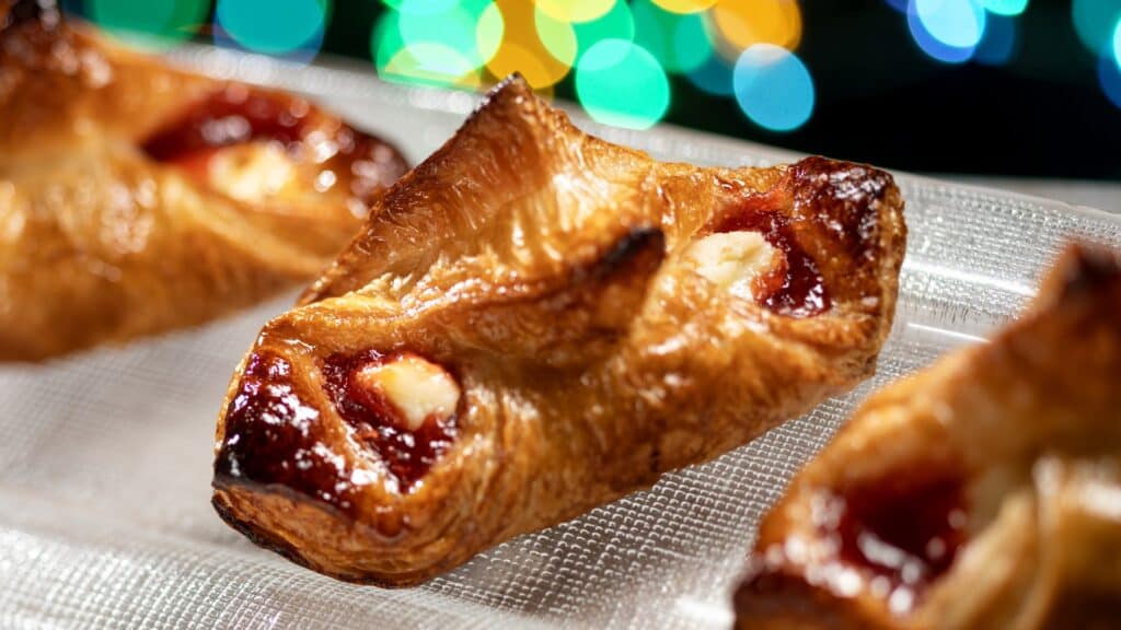 Cherry Danish pastry with flaky layers and vibrant fruit filling.
