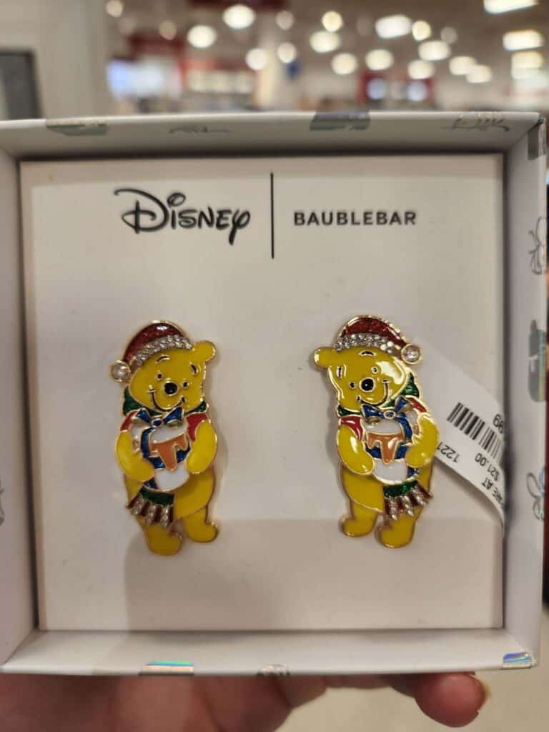 Colorful Winnie the Pooh Christmas earrings in Disney jewelry box.
