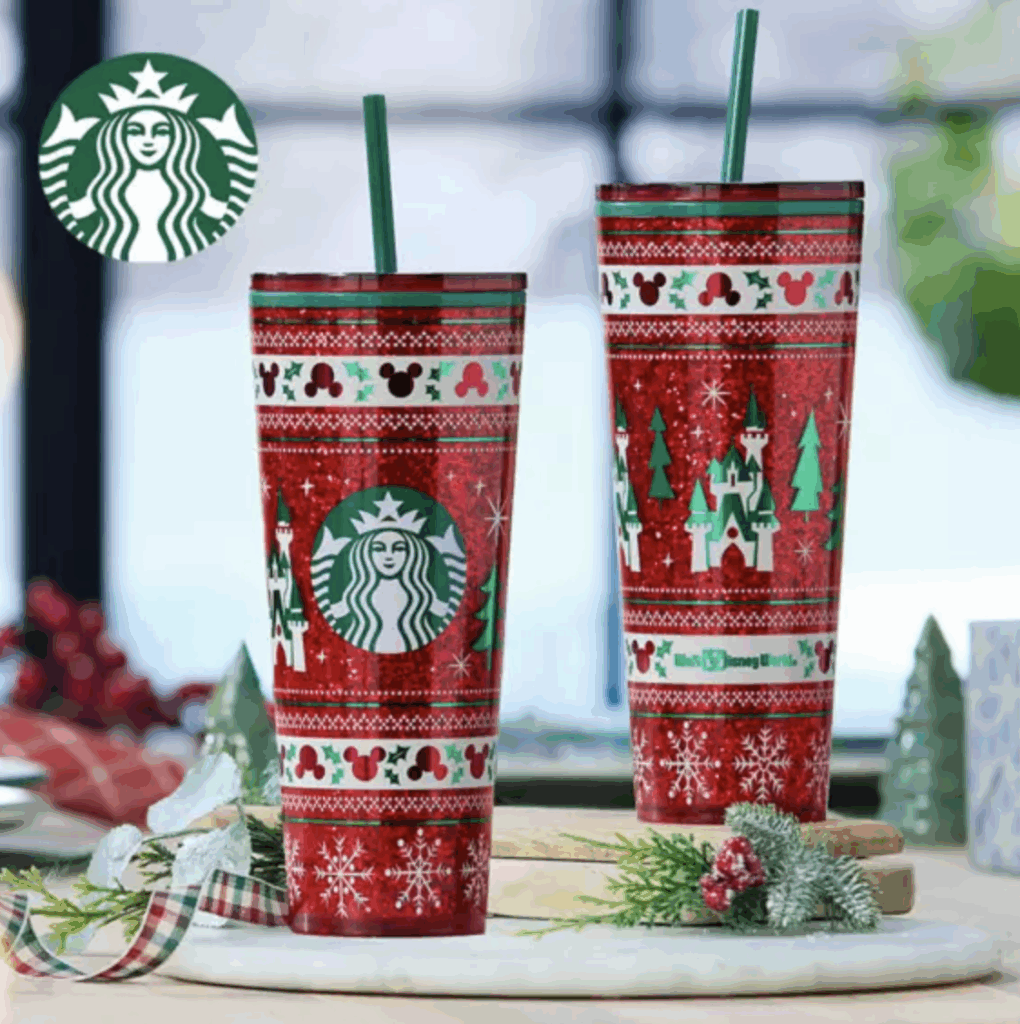 Red Disney Christmas Starbucks cups with castle and holiday motifs, perfect for Disney themed holiday celebrations.
