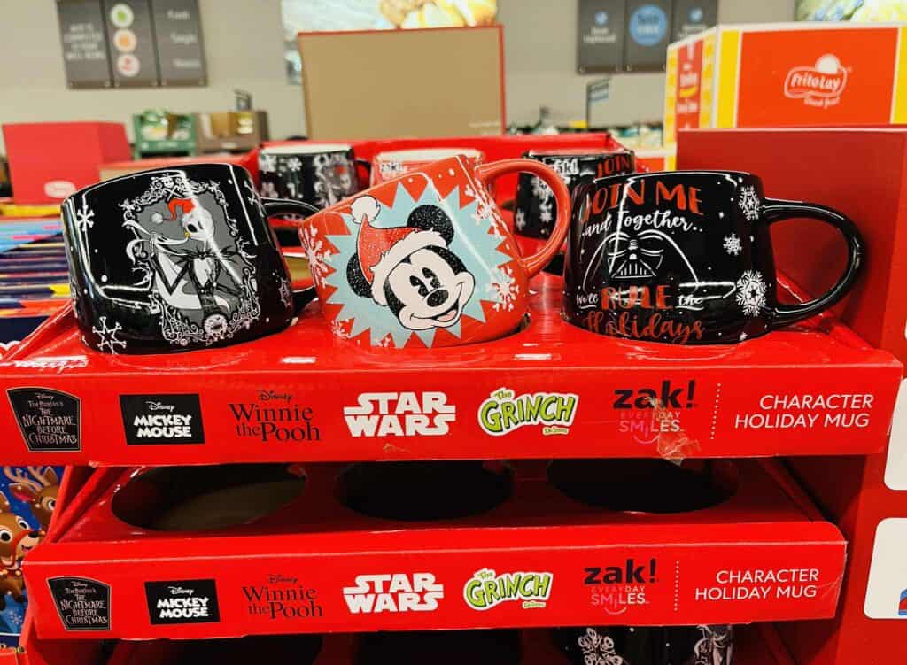 Cute Disney character holiday mugs featuring Mickey Mouse, Minnie Mouse, and Darth Vader with festive designs.