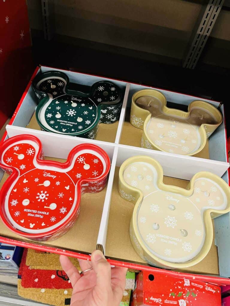 Colorful Disney Mickey Mouse-shaped scented candles with holiday holiday winter snowflake patterns, perfect for Disney fans.