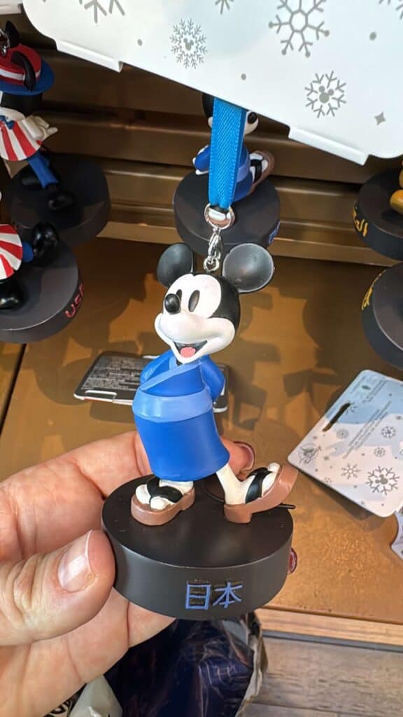 Mickey Mouse keychain featuring a Japan-inspired design, perfect for Disney collectors and fans.