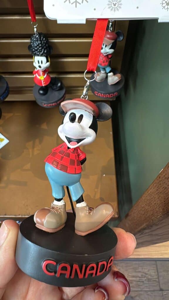Mickey Mouse Canada-themed keychain featuring a colorful winter outfit, perfect for Disney fans and collectors.