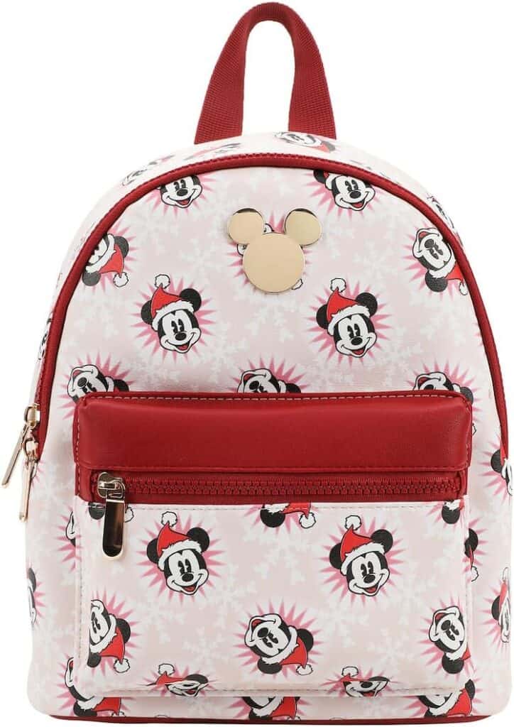 Mickey Mouse Christmas backpack with snowflake pattern, red accents, and Mickey silhouette embellishment.