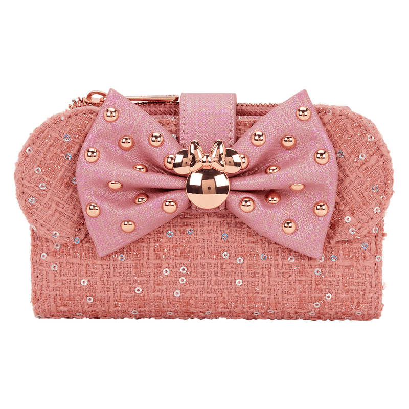 Pink Disney Minnie Mouse clutch bag with bow and sequin details, perfect for Disney-themed fashion events.