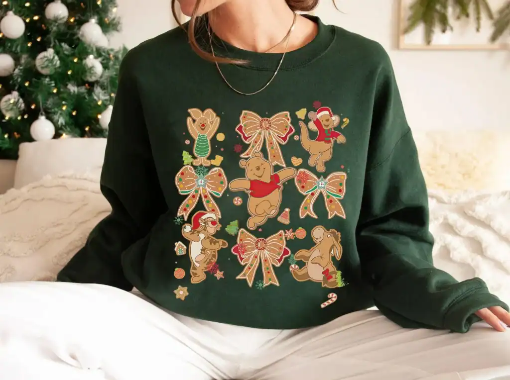 Decorative Disney holiday sweater featuring Winnie the Pooh and friends with holiday bows and ornaments.