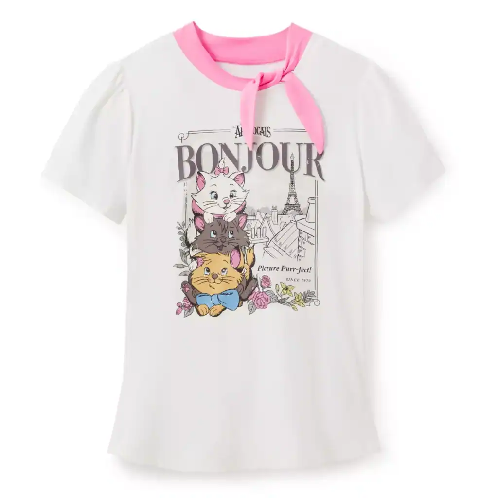 Cute Disney cats graphic tee with pink neck ribbon, Paris background, perfect for Disney fans.