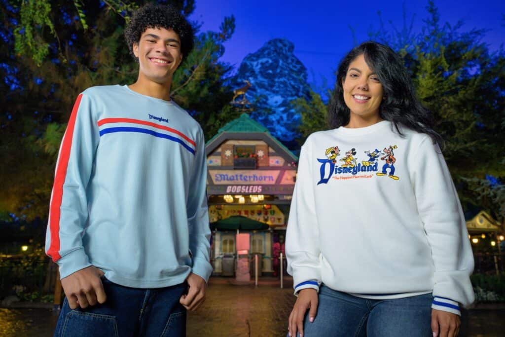 Vibrant Disneyland-themed sweatshirts featuring classic Disney characters, perfect for family fun and park visits.