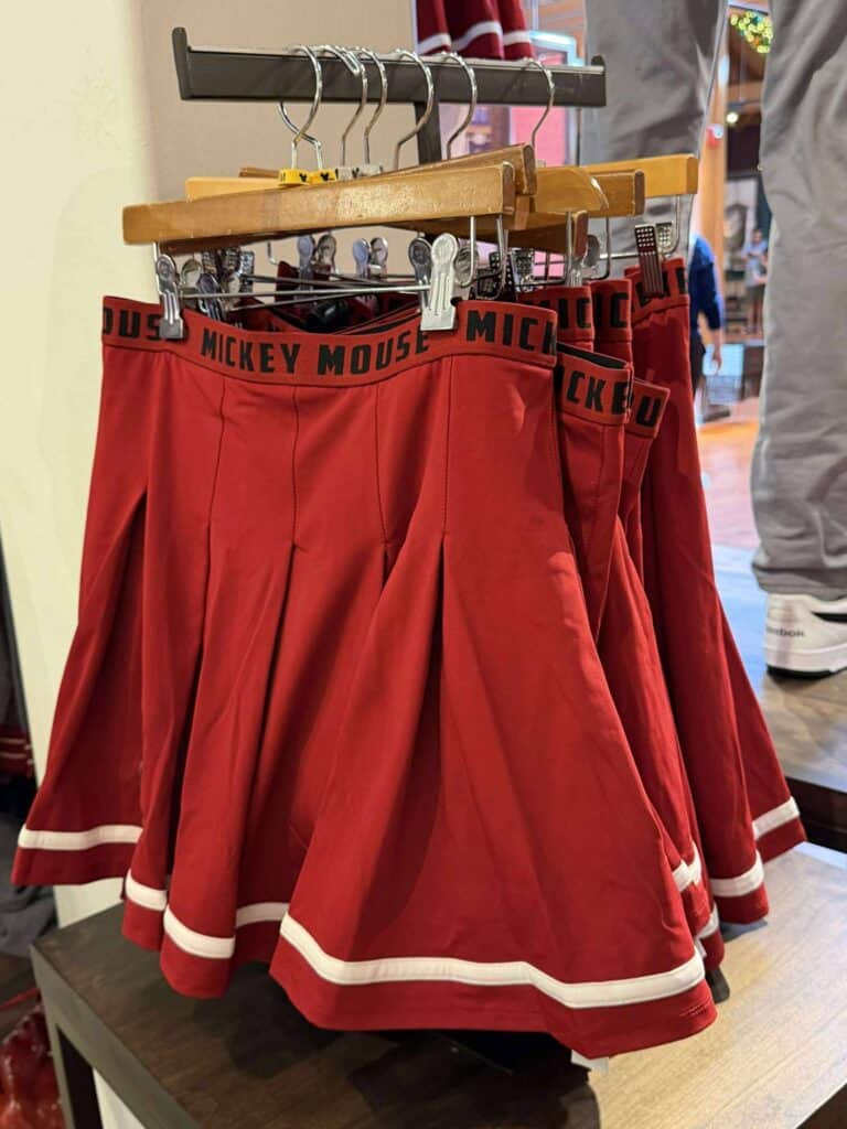 Adorable red Disney Mickey Mouse cheerleader skirts for children, featuring iconic Mickey Mouse branding on the waistband.