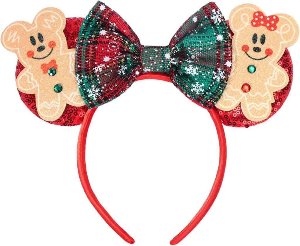 Colorful holiday-themed Minnie Mouse headband featuring gingerbread cookie accents and a plaid bow, perfect for Christmas celebrations.