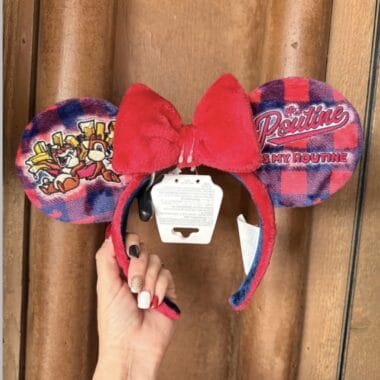 Disney Minnie Mouse headband with plush red bow, plaid ears, and Disney-themed patches for fans and Disney lovers.