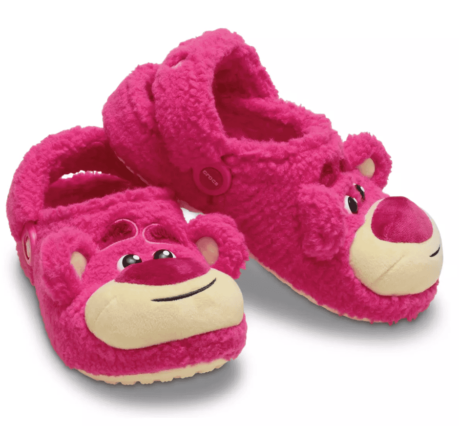 Cozy pink Disney teddy bear slippers with character face, perfect for Disney fans and comfortable home wear.