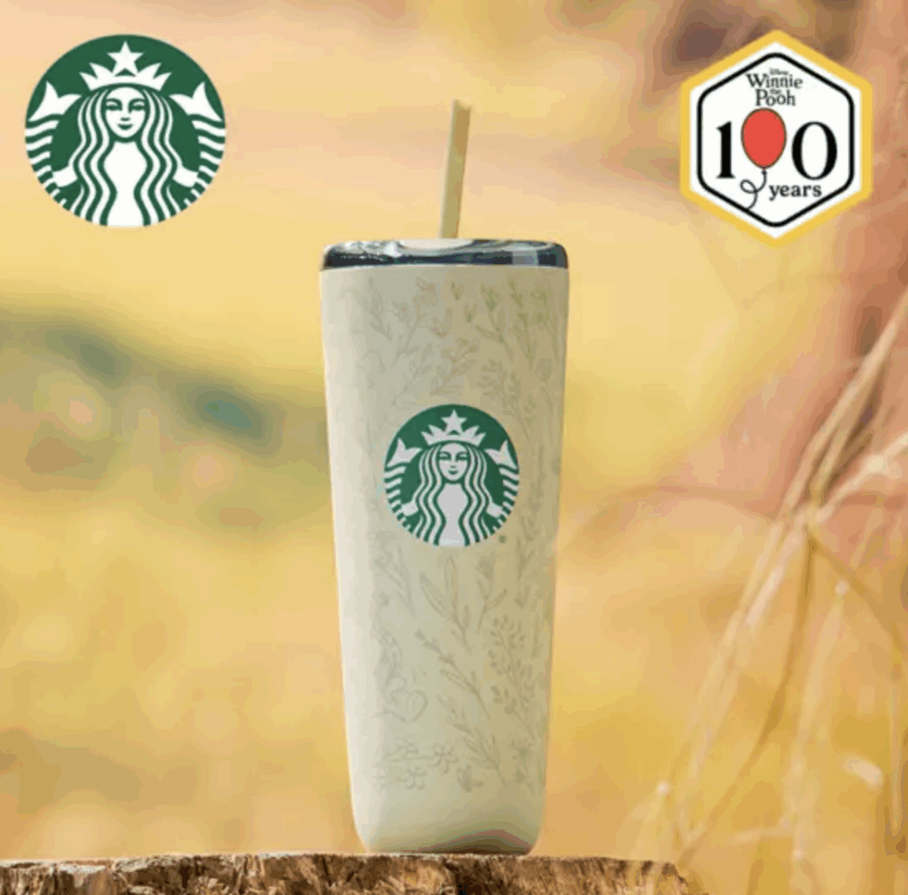 Custom Starbucks tumbler with Winnie the Pooh 100th Anniversary design, perfect for Disney fans.