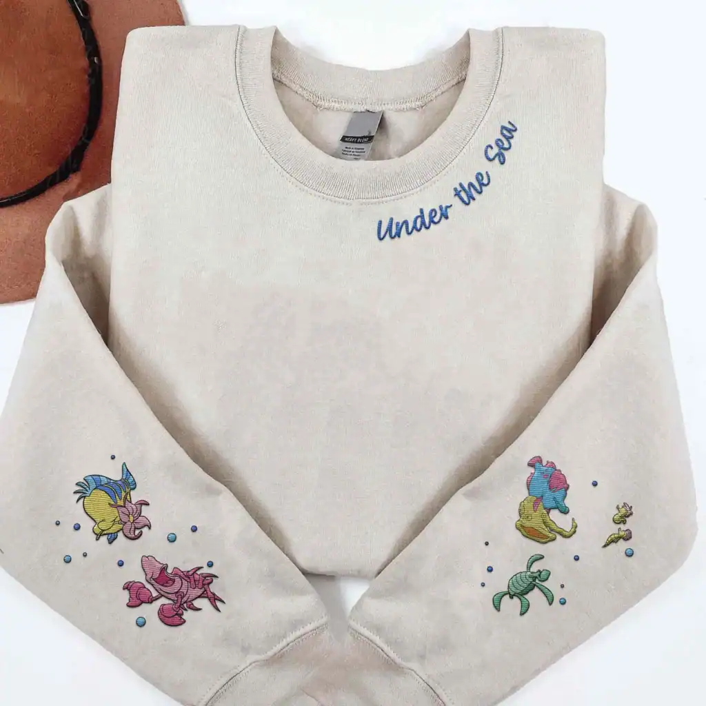 Disney sweatshirt with Ariel and Flounder embroidery, perfect for Disney fans and casual fashion outfits.
