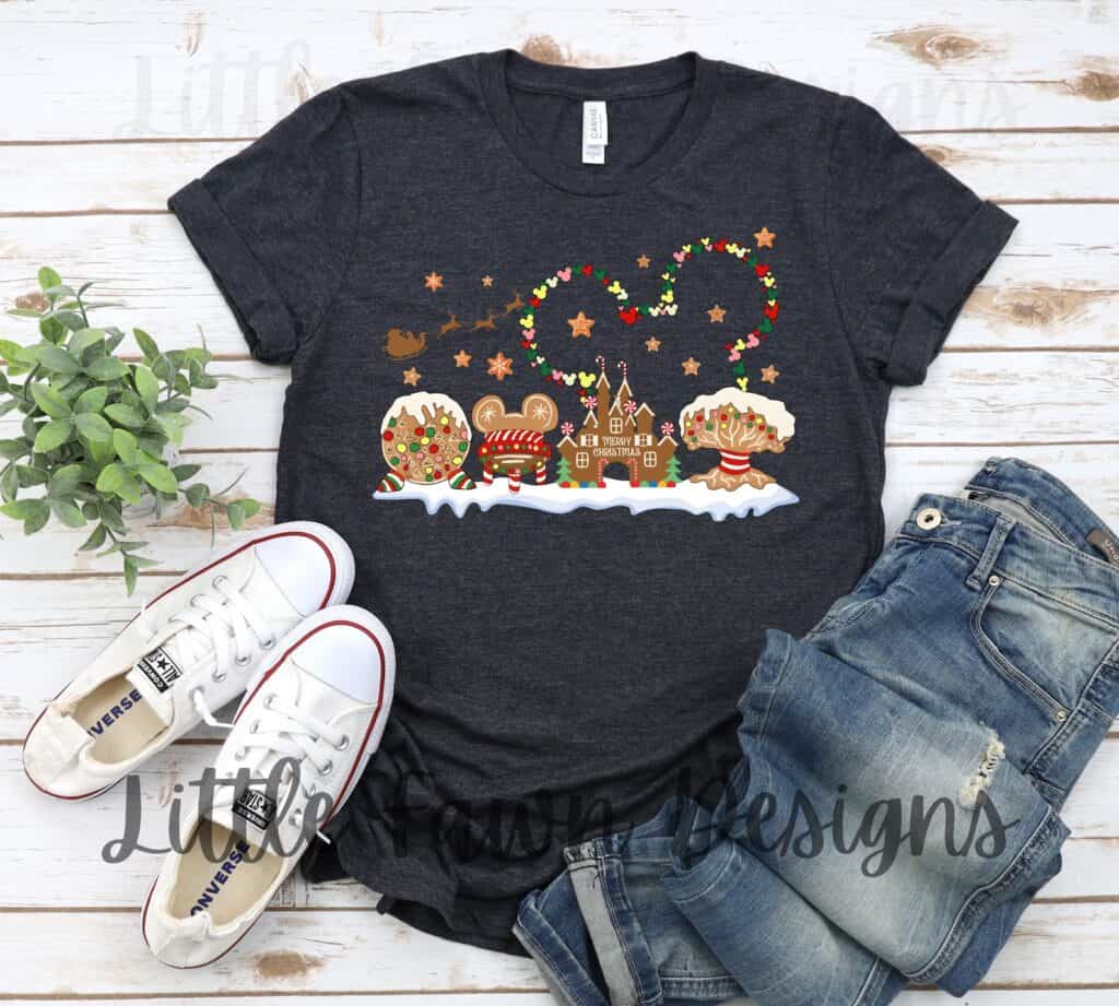 Cute Disney holiday graphic T-shirt with Christmas cookies and castle design.
