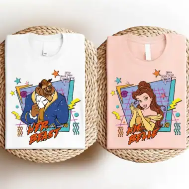 Colorful Disney Beast and Belle graphic tee shirts with vibrant designs and fun elements.