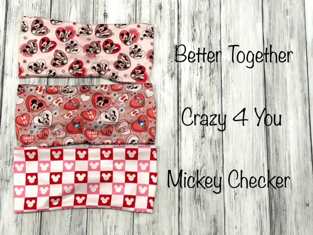Colorful Disney Mickey Mouse themed Valentine's Day fabric collection for crafting or sewing projects.