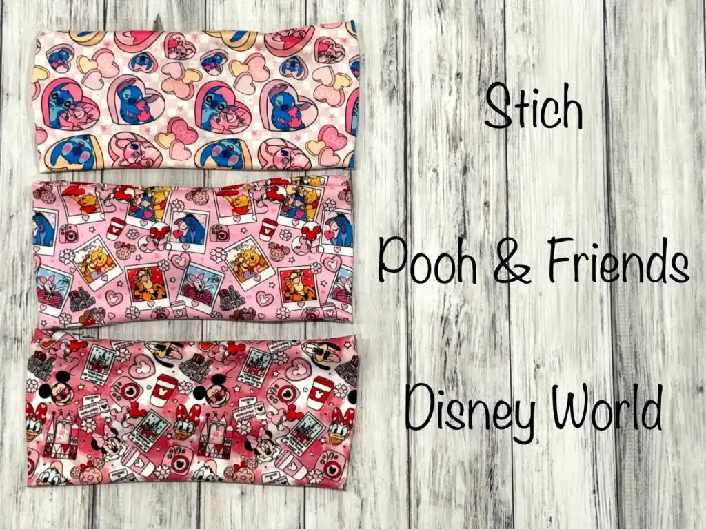 Disney face masks with Stitch, Poo, and Minnie Mouse prints, featuring vibrant, colorful Disney character illustrations for kids and adults.