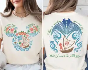Disney themed T-shirt with vibrant floral and boat design, perfect for Disney fans.