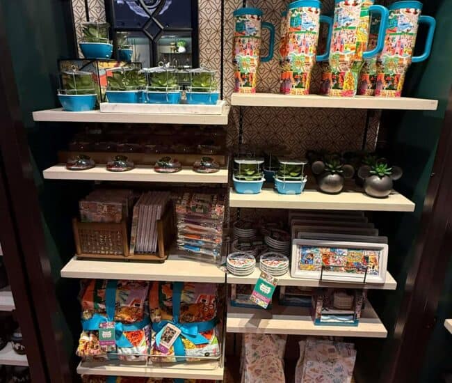 Colorful Disney-inspired drinkware, plates, and kitchen accessories for Disney fans.