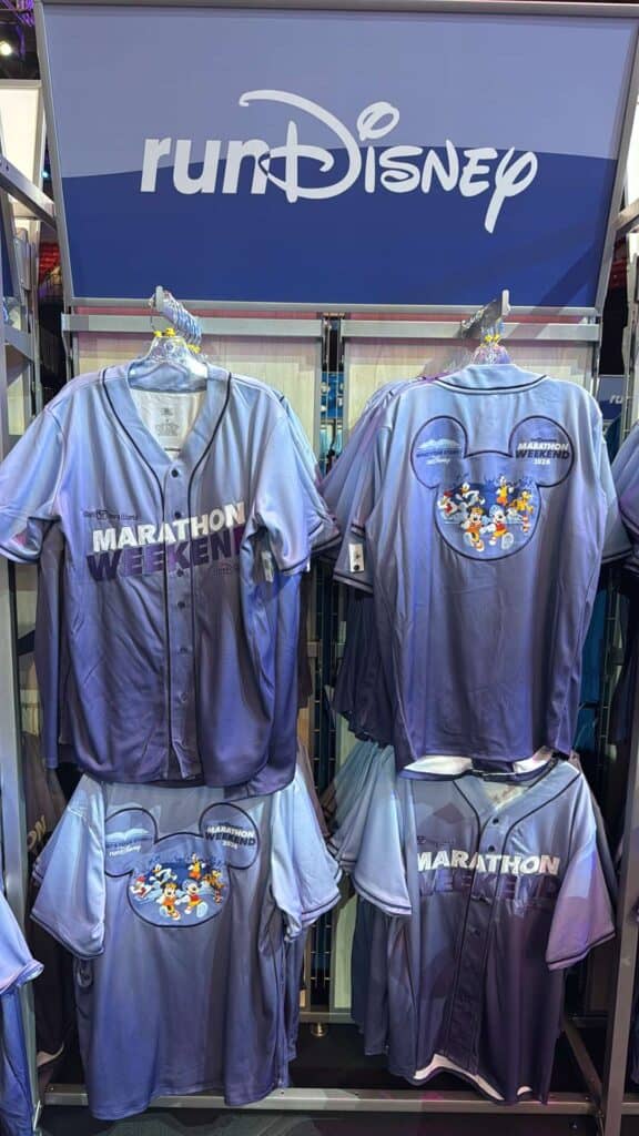 Running costumes and Disney race merchandise, including Mickey-themed race shirts, for marathon weekend enthusiasts.