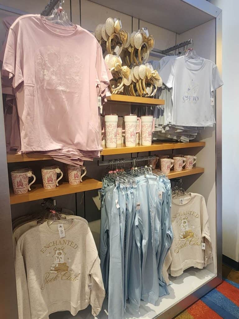 Colorful Disney-themed apparel, mugs, and accessories for fans and collectors.