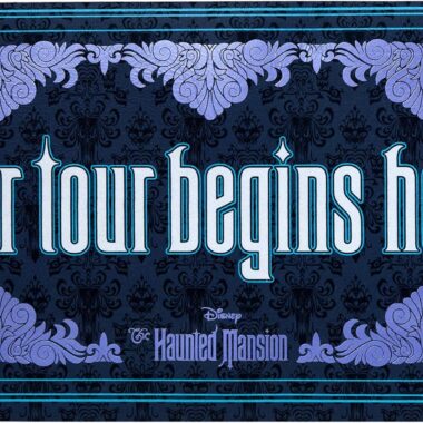 Classic Disney Haunted Mansion graphic with elegant purple and blue design elements.