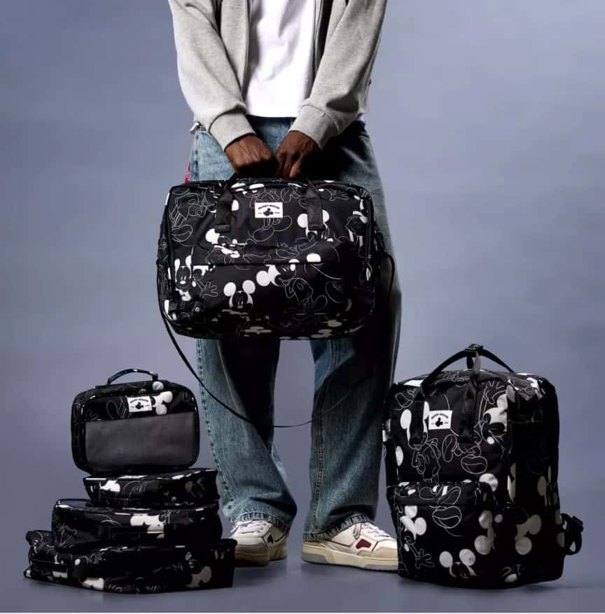 Stylish Disney Mickey Mouse travel backpack with multiple compartments for Disney fans.