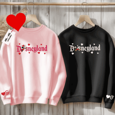 Cute Disneyland-themed sweatshirts with heart and Mickey Mouse designs for fans.