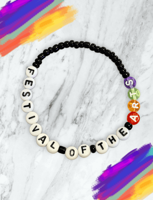 Colorful beaded bracelet with Disney-inspired message and rainbow accents.