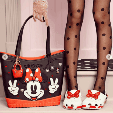 Colorful Disney Minnie Mouse tote bag with accessories.