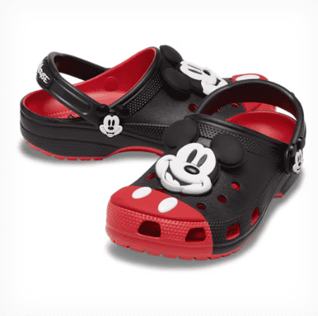 Colorful Mickey Mouse-themed Crocs with playful design and adjustable strap for kids and adults.