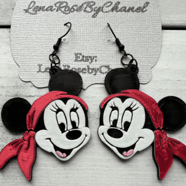 Colorful Disney cruise pirate night jewelry featuring Minnie and Mickey Mouse motifs.