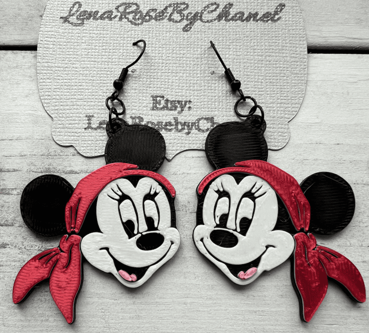 Colorful Disney cruise pirate night jewelry featuring Minnie and Mickey Mouse motifs.