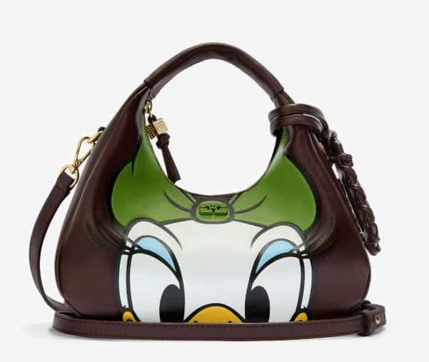 Stylish handbag featuring Daisy Duck's face with green and brown accents for Disney fans.