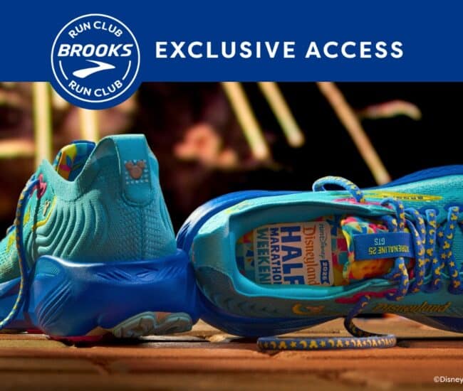 Bright blue Disney RunDisney shoes with commemorative Disneyland 70th anniversary logo, perfect for Disney marathon events.