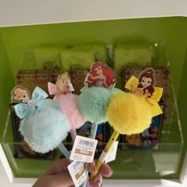 Colorful Disney princess plush pom-pom pens with character toppers from The Disney Fashionista collection.
