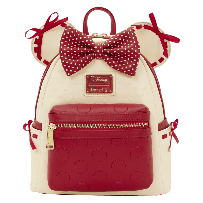 Cute Disney Minnie Mouse backpack with polka dot bow and ear details.
