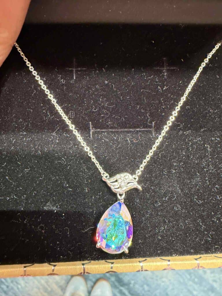 Beautiful Disney jewelry featuring a sparkling crystal teardrop and charming swan design for Disney fashionistas.