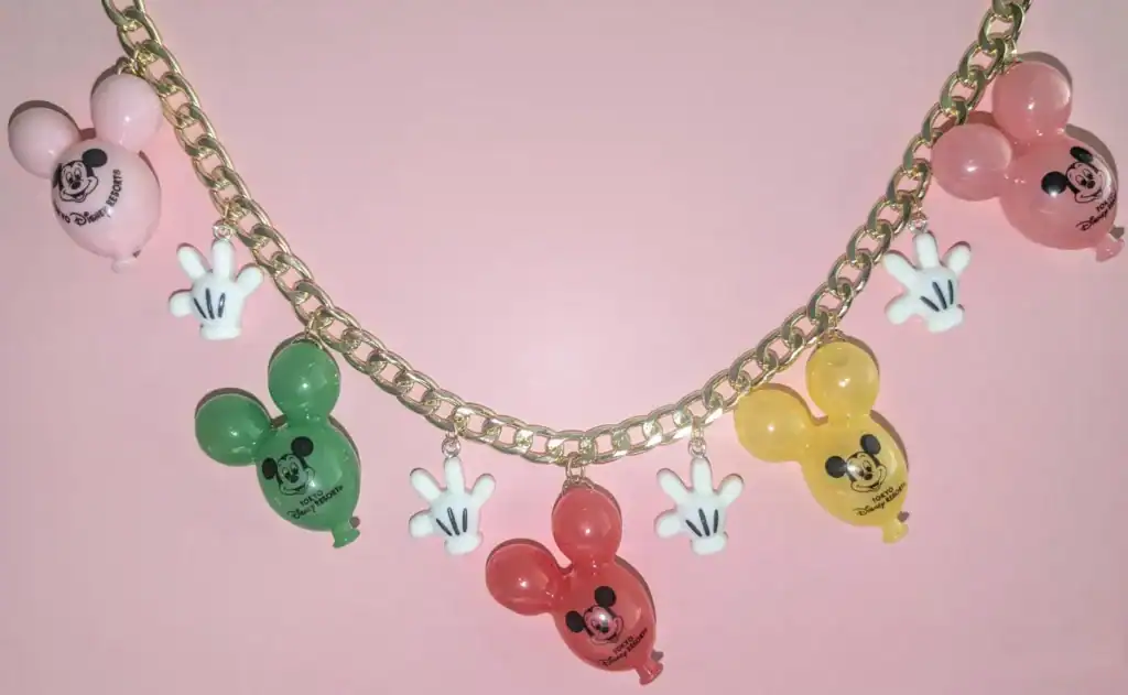 Vibrant Disney Mickey Mouse balloon charm necklace with colorful toggles and playful accessories.