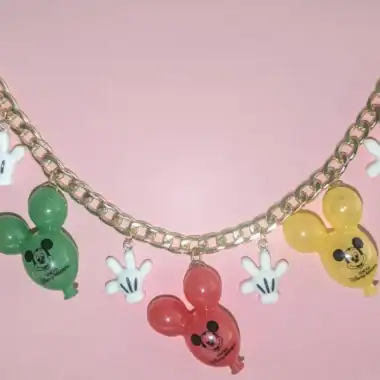 Vibrant Disney Mickey Mouse balloon charm necklace with colorful toggles and playful accessories.