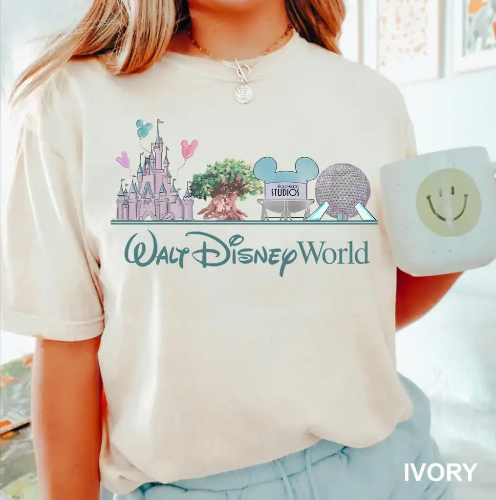 Cute Walt Disney World graphic tee with castle, Hollywood Studios logo, and iconic attractions.
