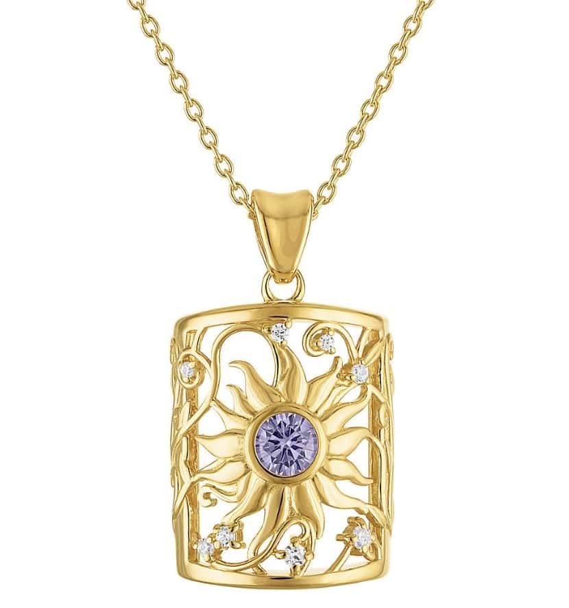 Elegant gold sun and moon pendant necklace with sparkling gemstones.