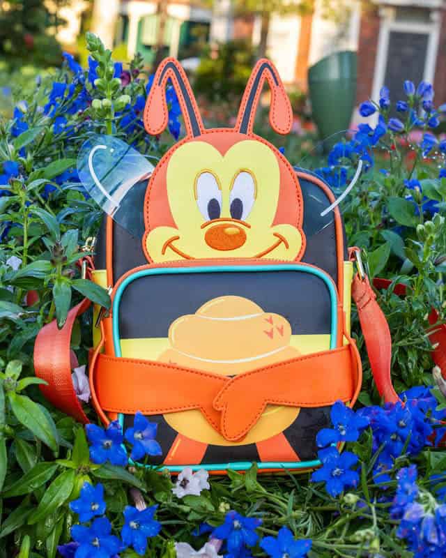 Colorful Disney Minnie Mouse backpack with bunny ears and cheerful design.