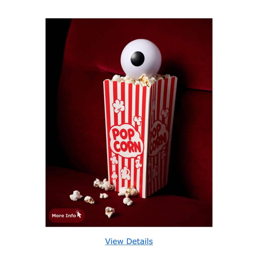 Popcorn box with a large eyeball on top, styled like a Disney-themed accessory or decor.