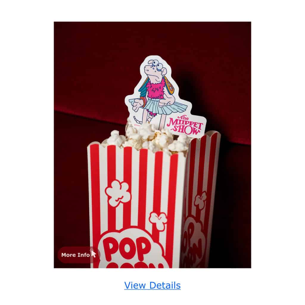 Disney Muppet Show popcorn bucket featuring Miss Piggy figure and red-striped design.