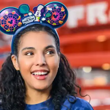 Woman wearing Disney Food & Wine Festival ears at California Adventure.