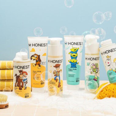 Disney-inspired baby skincare products with colorful character packaging.