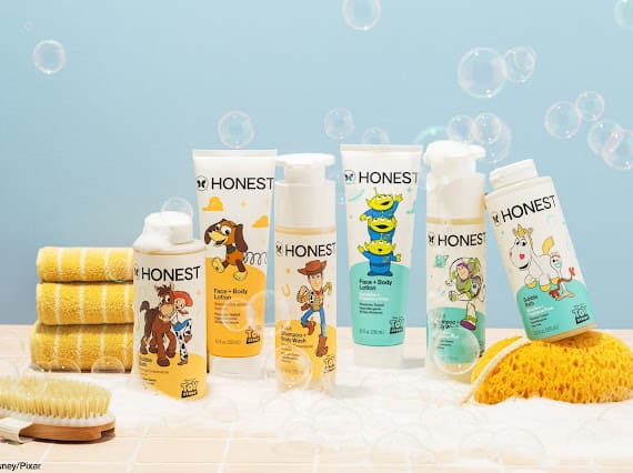 Disney-inspired baby skincare products with colorful character packaging.