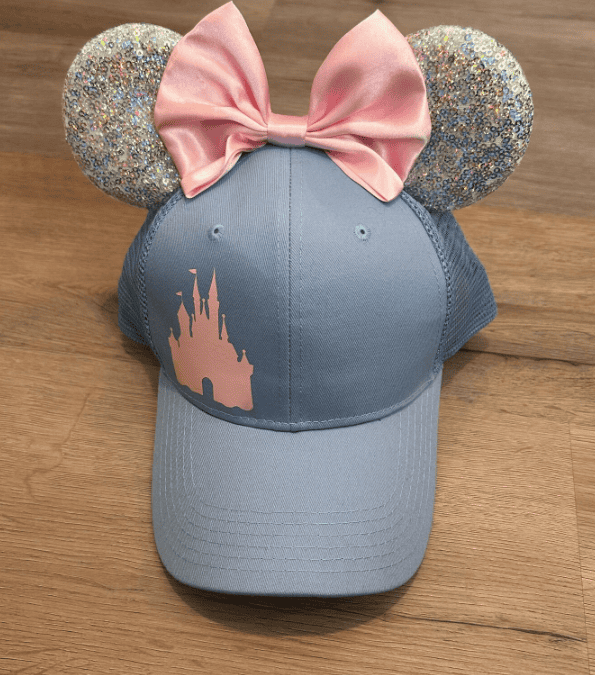 Princess castle and mouse ears baseball cap for Disney fans.